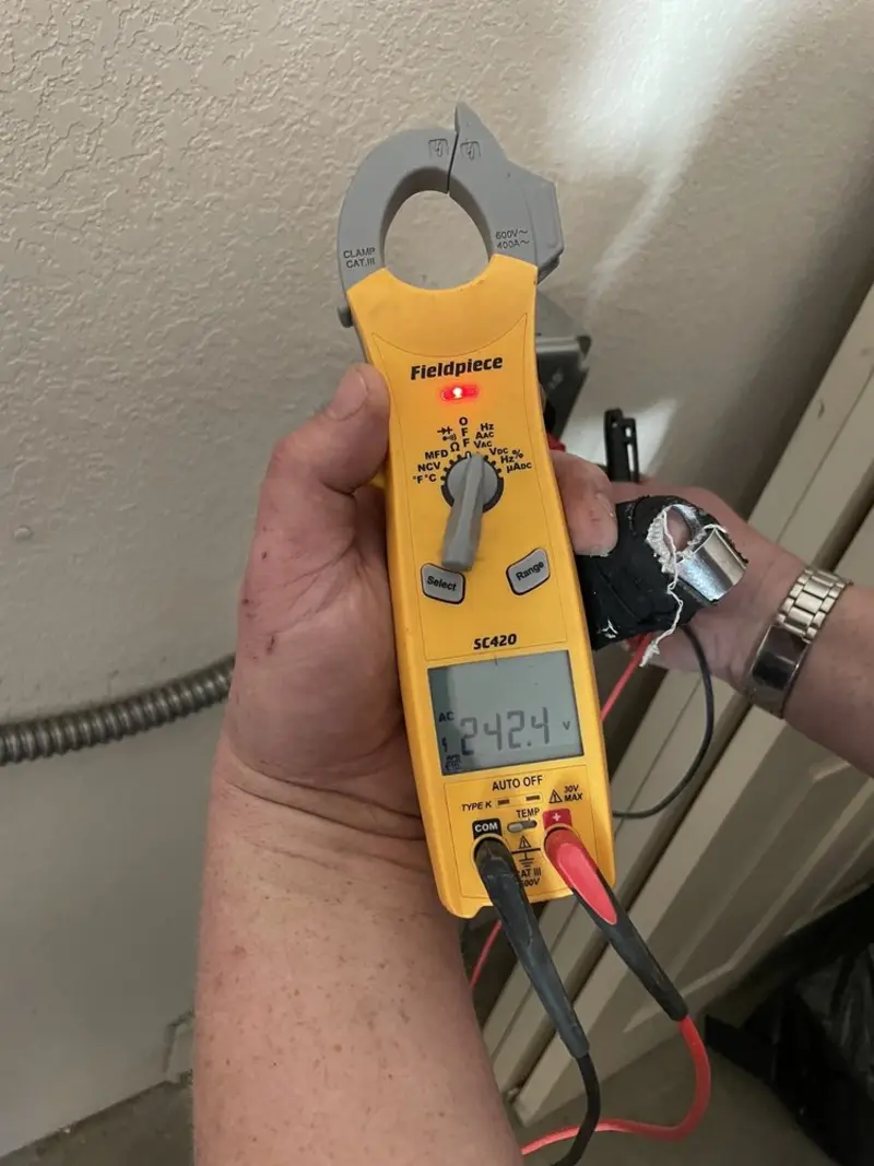 Voltage testing with clamp meter during Hot Tub / Pool Electrical Wiring in Grandview